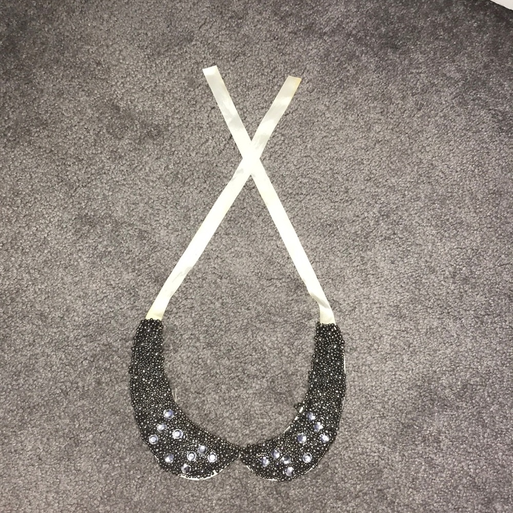 Bejeweled collar.